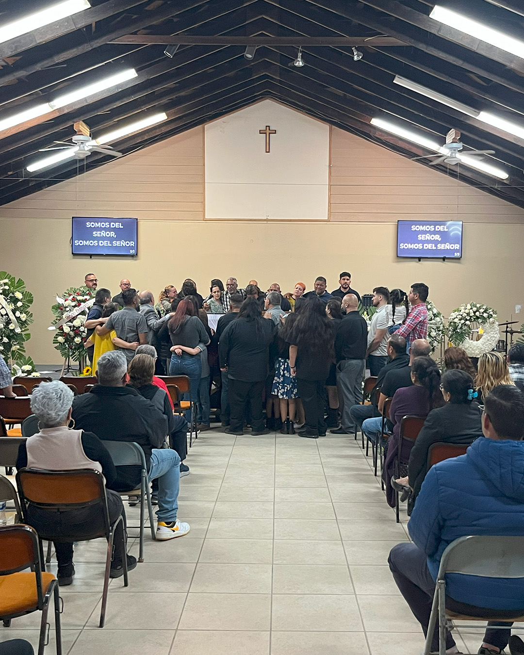 Ramon's family and attending orphanage alumni filled the stage