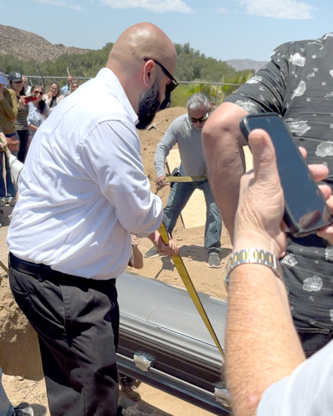 Lowering the casket